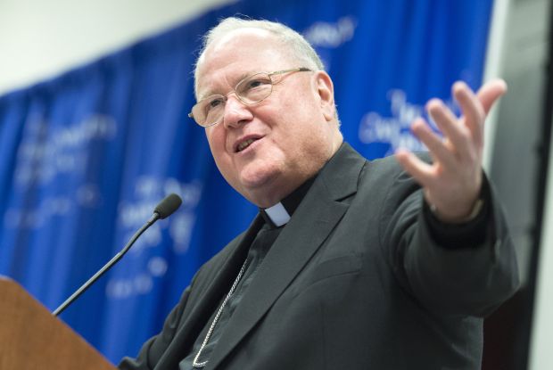 Cardinal Timothy M. Dolan of New York speaks May 20 during Nostra Aetate: Celebrating Fifty Years of the Catholic Church's Dialogue with Jews and Muslims, a three-day symposium of scholars at The Catholic University of America in Washington. (CNS photo/Ed Pfueller, Catholic University of America)